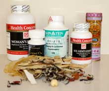 bottels of herbas and raw herbs